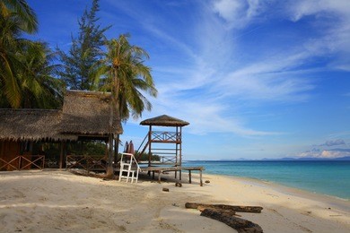 afternoon at mantanani island, sabah, north borneo. the mantanani islands form a small group of three islands off the north-west coast of the state of sabah, malaysia, east malaysia. 