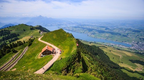 panoramic landscape view of lake lucerne and mountain ranges from rigi kulm viewpoint, lucerne, switzerland, europe.