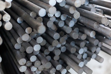 round rolled steel stored in the warehouse. designed for wholesale, retail sale or for the manufacture of parts at the plant or fittings for the construction