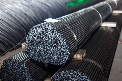 round rolled steel stored in the warehouse. designed for wholesale, retail sale or for the manufacture of parts at the plant or fittings for the construction