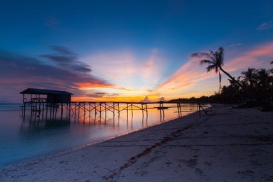 afternoon at mantanani island, sabah, north borneo. the mantanani islands form a small group of three islands off the north-west coast of the state of sabah, malaysia, east malaysia. 