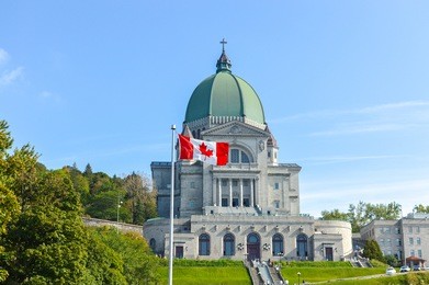 saint joseph's oratory of mount royal located in montreal is canada's largest church and the canadian flag