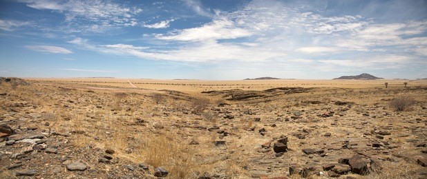 surreal panorama of the namib desert going towards solitaire and sossusvlei