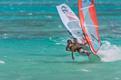 couple of windsurfers playing in the lagoon