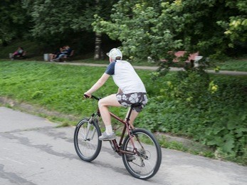 the young man is an athlete rides a bicycle