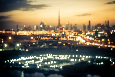 blurred aerial view of dubai at night time