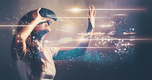 digital screen with young woman using a virtual reality headset