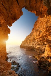 sunset into grotto. nature composition.