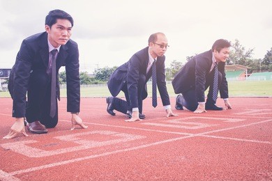 group of business people in suit uniform ready to start the race in track. business challenge concept.