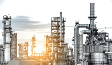 close up industrial view at oil refinery plant form industry zone with sunrise/sunset background,oil and gas industry,pipe line close up
