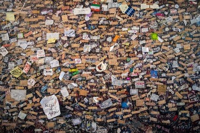 love messages cover the wall at juliet's house in verona, italy