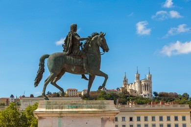 statue of louis xiv in lyon, france in a beautiful summer day