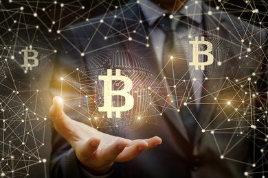 businessman showing bitcoin in the background network.