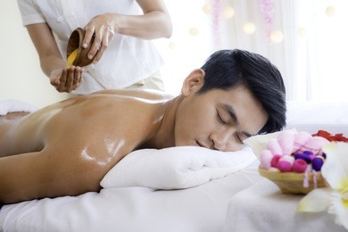 a handsome man relaxing at the spa, beauty treatment concept