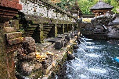 holy spring water with hindu's arts and architecture at balinese tirta empul, bali, indonesia