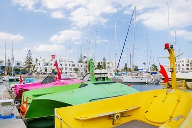 colorful catamarans in sea port el kantaoui, tunisia.