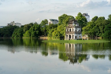 turtle tower (thap rua) in hoan kiem lake (sword lake, ho guom) in hanoi, vietnam.