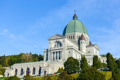 saint joseph's oratory of mount royal located in montreal is canada's largest church and the canadian flag