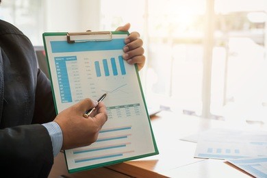 business man working at office explain and plan documents financial reports