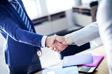 business handshake in the office