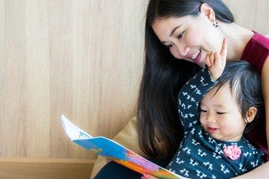 mother reading with her child. reading and learning time.