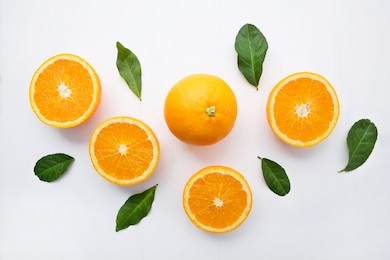 fresh orange citrus fruit on  white wooden background. top view