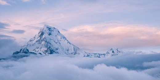 himalayan mountain top above the clouds, annapurna, nepal