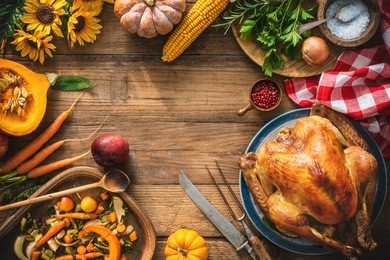 christmas or thanksgiving turkey on rustic wooden table