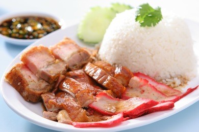 bbq pork, duck and crispy pork over rice with sweet gravy sauce (kao che po)
