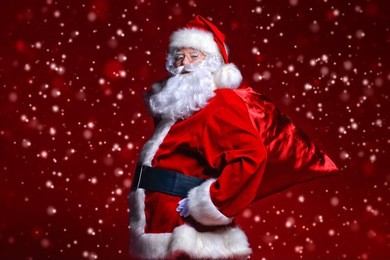 christmas concept. portrait of a fairytale santa claus over red background. good old traditions. family holidays.