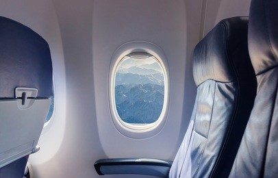 empty seat airplane and window view inside an aircraft