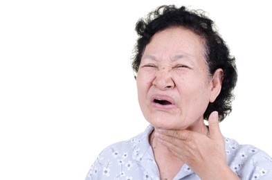 asian senior woman sore throat expression over white background
