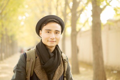 handsome asian men who admire the scenery in the park