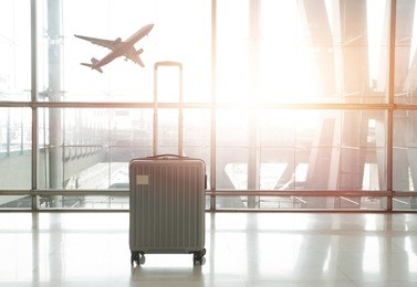 traveling luggage in airport terminal, concept of travel by air plane