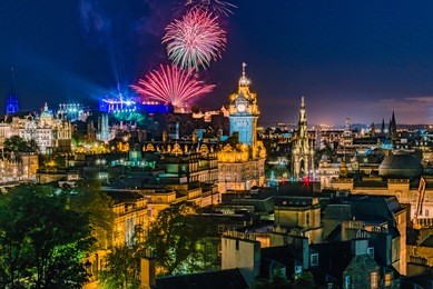  fireworks on the city of edinburgh in scotland england during 'edinburgh military tattoo, military parade taking place on the great edge of edinburgh castle