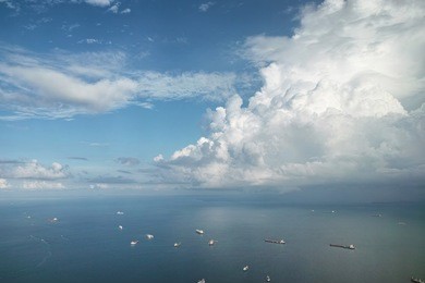 aerial view of the strait of malacca in a sunny cloudy day.