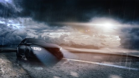 high speed, black sports car on the road (with grunge/dust overlay) brand less - futuristic concept - 3d illustration