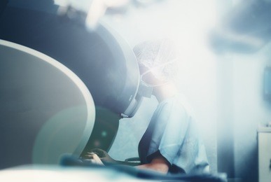 surgical room in hospital with robotic technology equipment, machine arm surgeon in futuristic operation room. minimal invasive surgical inoovation, medical robot surgery with 3d view endoscopy