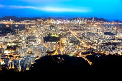 hong kong and kowloon by night as seen from lion rock