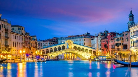 rialto bridge in venice, italy at twilight
