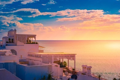 hammamet, tunisia. image of architecture of old medina with dramatic sky at sunset time.