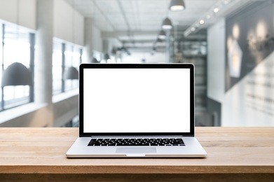 modern computer,laptop with blank screen on blur modern/contemporary hall backgrounds