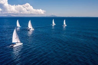 regatta sailboat and catamaran in mozambique channel