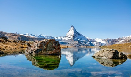  matterhorn peak reflected in stellisee lake in zermatt, switzerland.