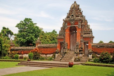 main entrance of taman ayun temple  (bali, indonesia) on a beautiful sunny day.