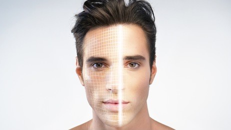 futuristic and technological scanning of the face of a beautiful man for facial recognition and scanned person. concept of:  future, security, scanning.