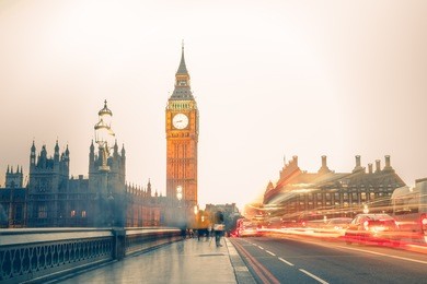 long exposure of the westminster bridge with big ben in the background at sunset, london england
