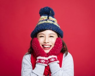 happy young beautiful woman in winter clothesÂ 

