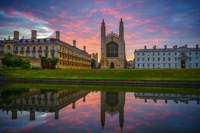 king's college with beautiful dramatic sky at sunrise in cambridge, uk