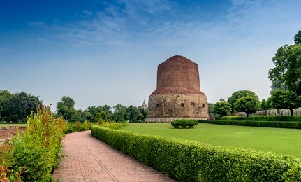 dhamek stupa is a massive stupa located at sarnath, 13 km away from varanasi in the state of uttar pradesh, india. stupas originated as pre-buddhist tumuli